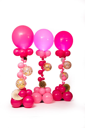 Large pink balloon towers